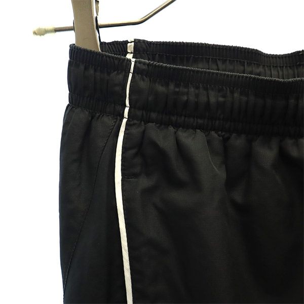 アンダーアーマー ワンポイント刺繍 トレーニング ウインドパンツ MD ブラック UNDER ARMOUR レディース