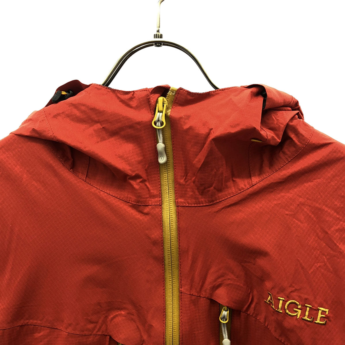 AIGLE エーグル ロゴ刺繍 マウンテンパーカー L オレンジ系 ナイロンジャケット アウトドア 8504-15401 メンズ