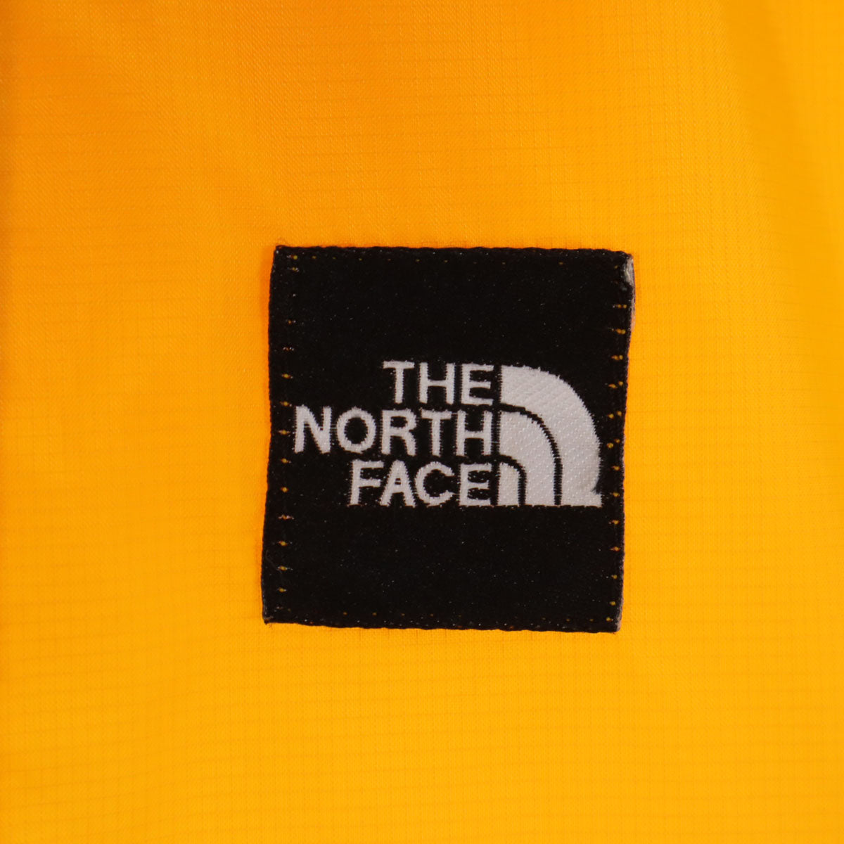 THE NORTH FACE ノースフェイス 長袖 ナイロンジャケット S 山吹色 アウトドア NP-0002 メンズ