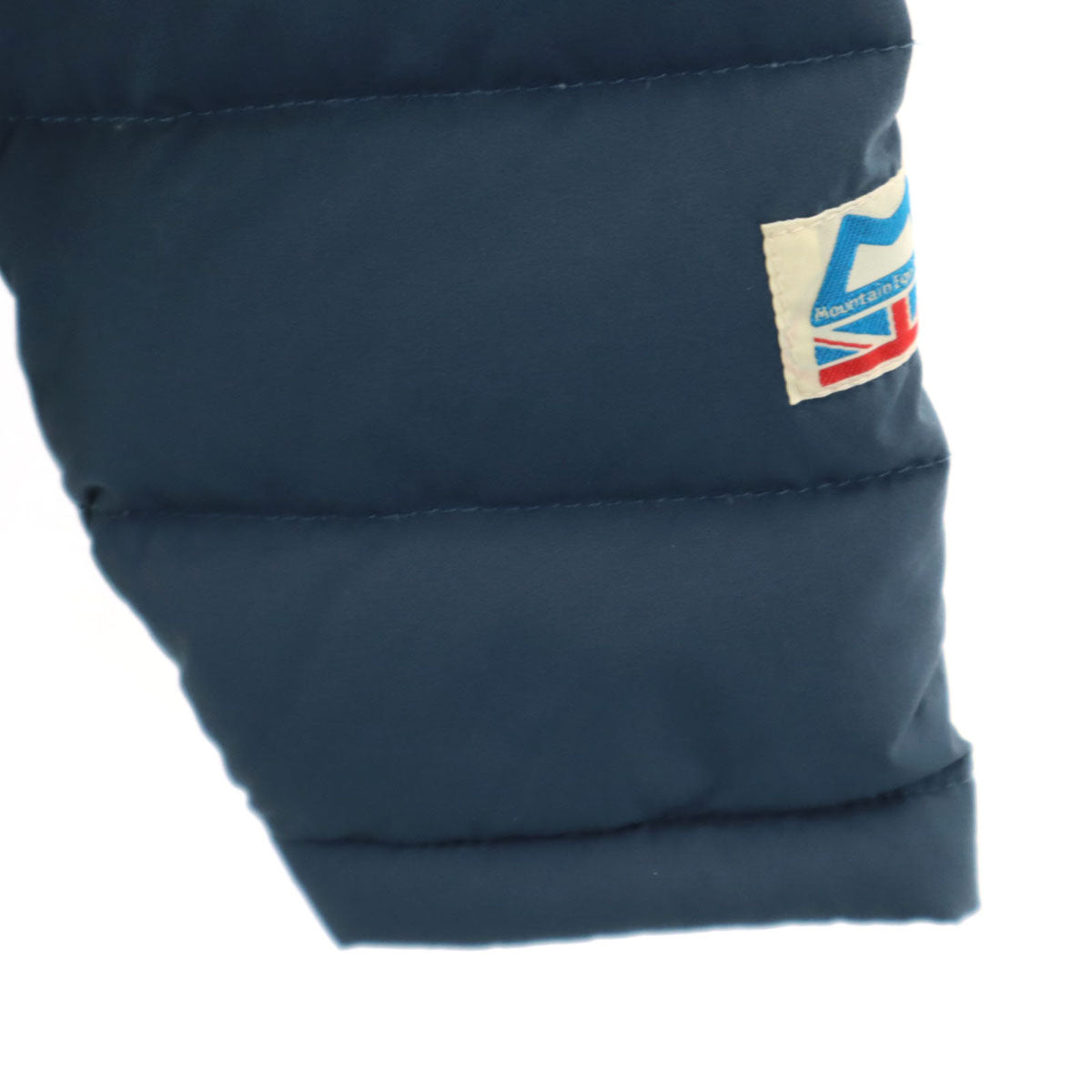 未使用 MOUNTAIN EQUIPMENT マウンテンイクイップメント ノーカラー ダウンジャケット S ネイビー 収納袋付き レディース