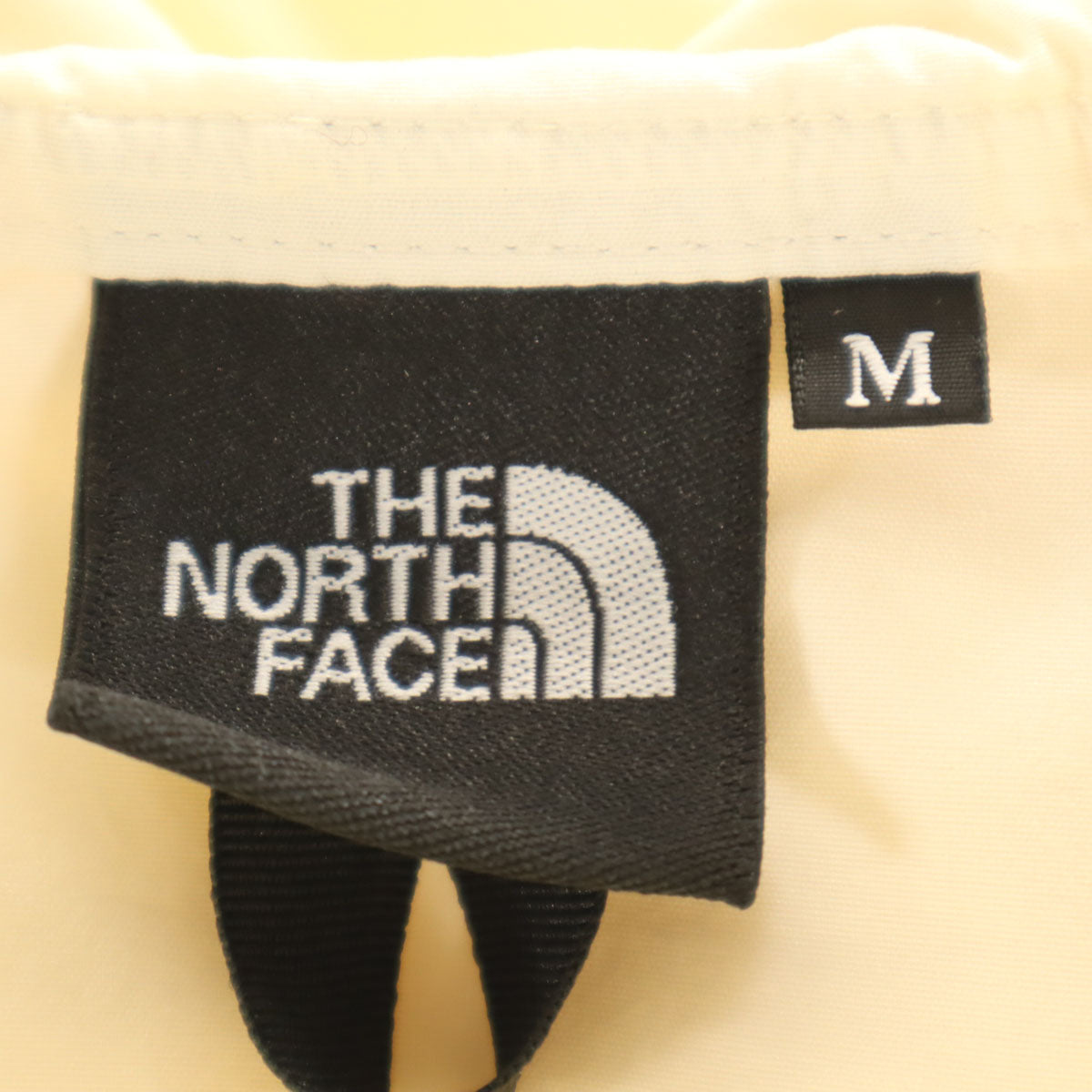 THE NORTH FACE ノースフェイス コンパクト アノラックパーカー M 生成り NP21735 アウトドア 収納袋付き メンズ