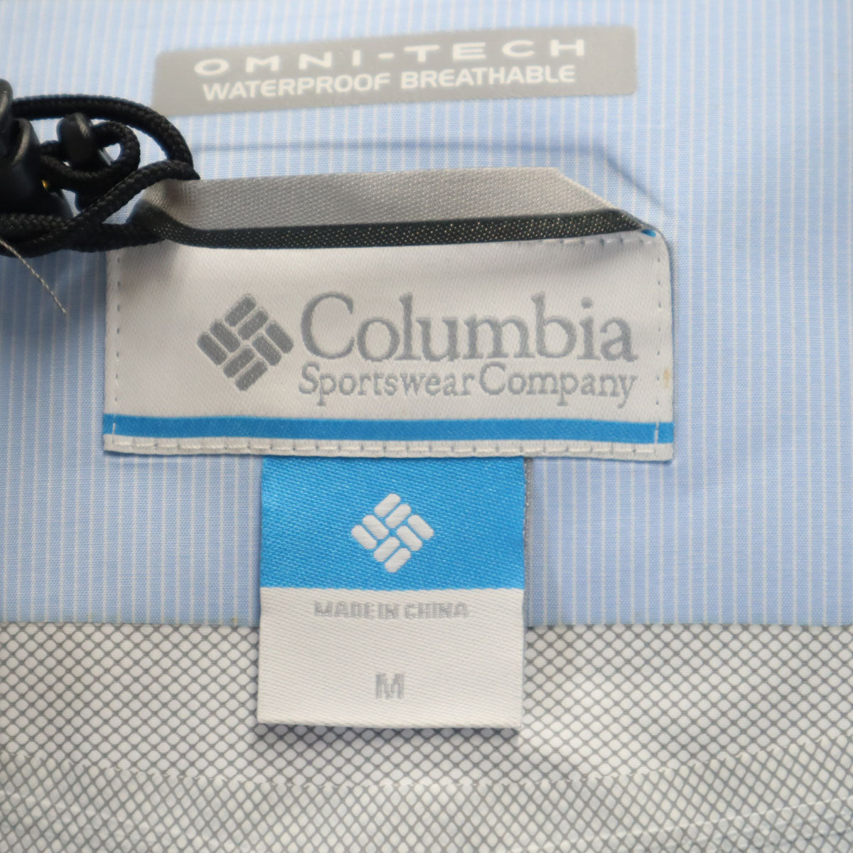 Columbia コロンビア ストライプ柄 レインコート M 水色 収納袋付き レディース