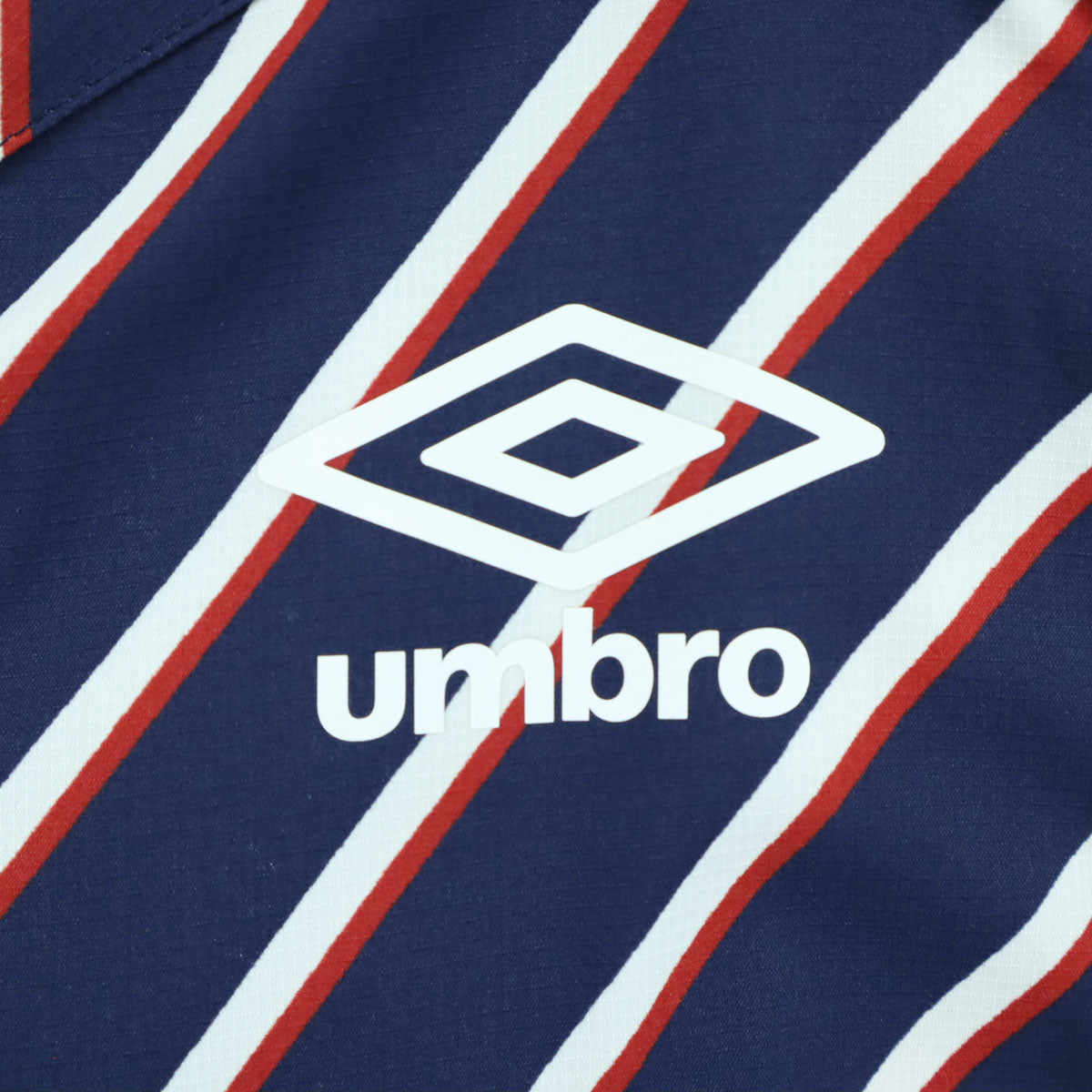 美品 umbro アンブロ UCS4441L ボーダー 長袖 フード付き ウインドブレーカー M ネイビー×レッド×ホワイト レディース