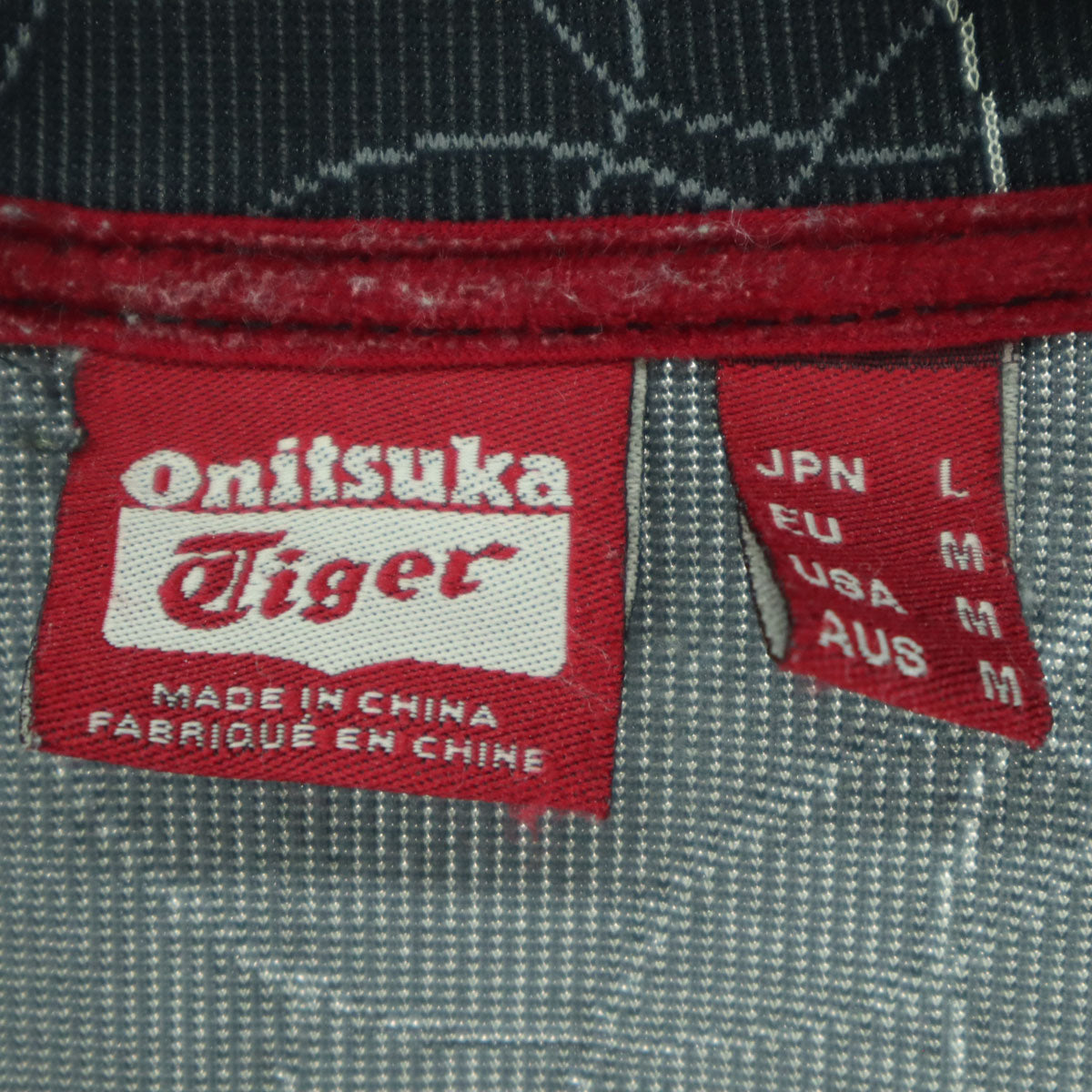 ONITSUKA TIGER オニツカタイガー 総柄 長袖 ジップジャケット L ブラック系 レディース