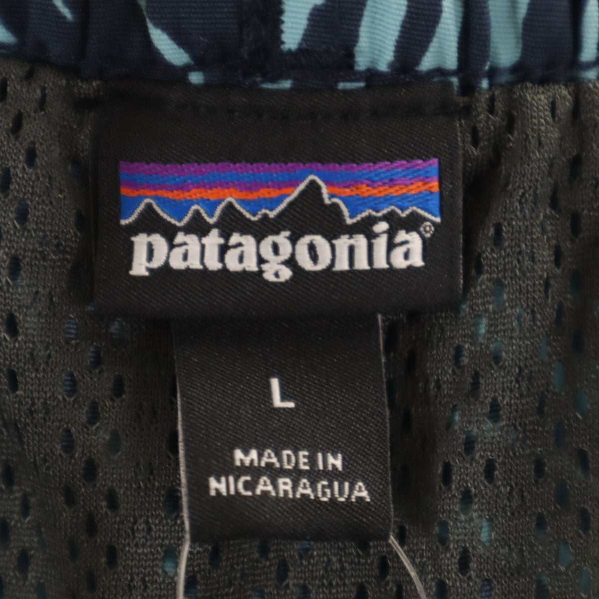 未使用 patagonia パタゴニア リーフ柄 バギーズ ショートパンツ L ネイビー 58034SP19 アウトドア メンズ