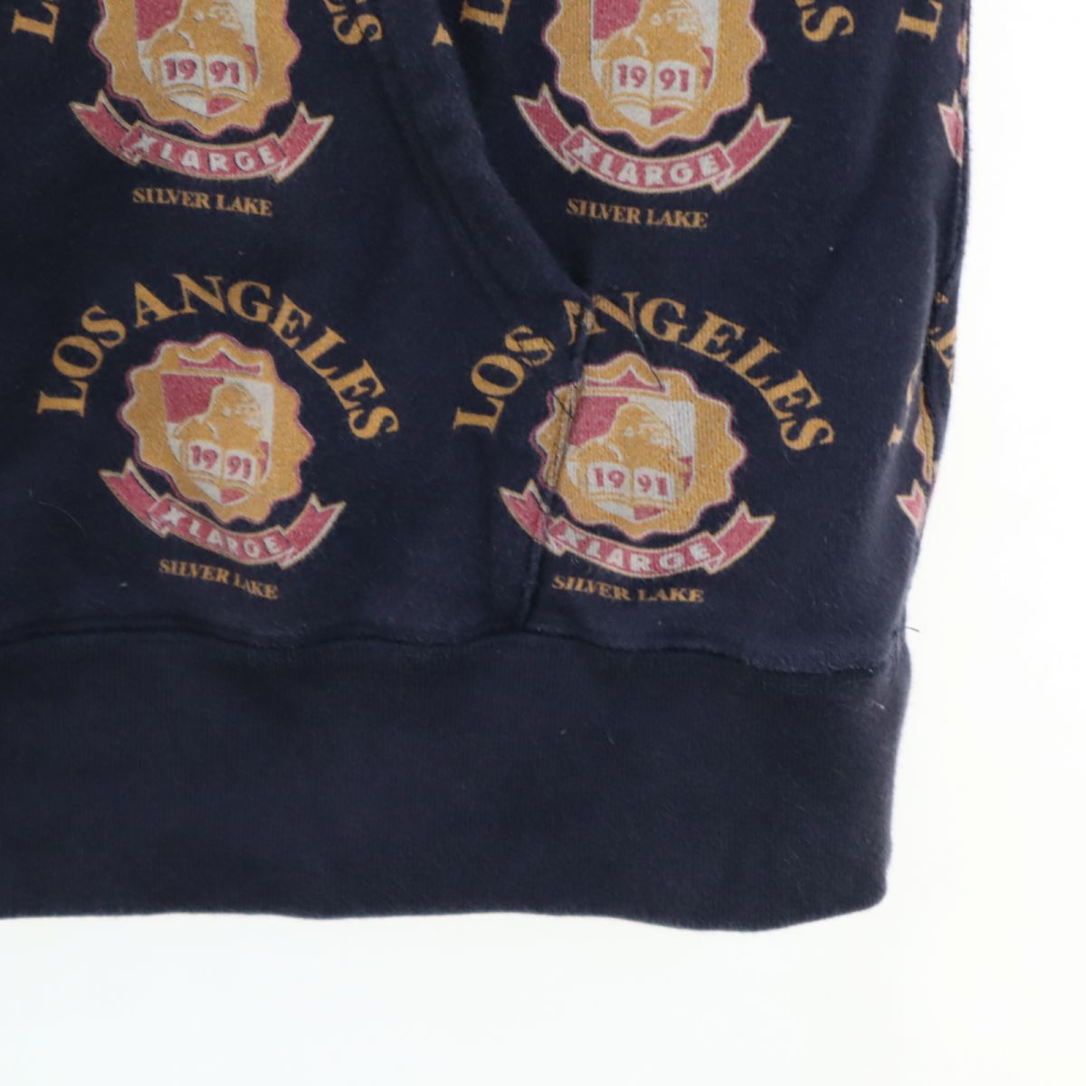 XLARGE エクストララージ 総柄 長袖 スウェットパーカー S ブルー系 裏起毛 メンズ