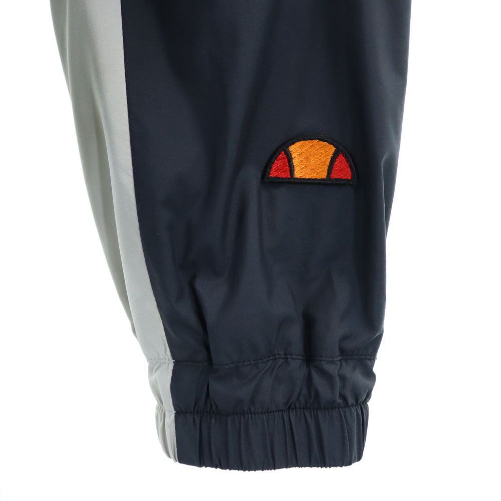 ナージー エレッセ コラボ トレーニング ウインドブレーカー F チャコールグレー NERGY ellesse レディース