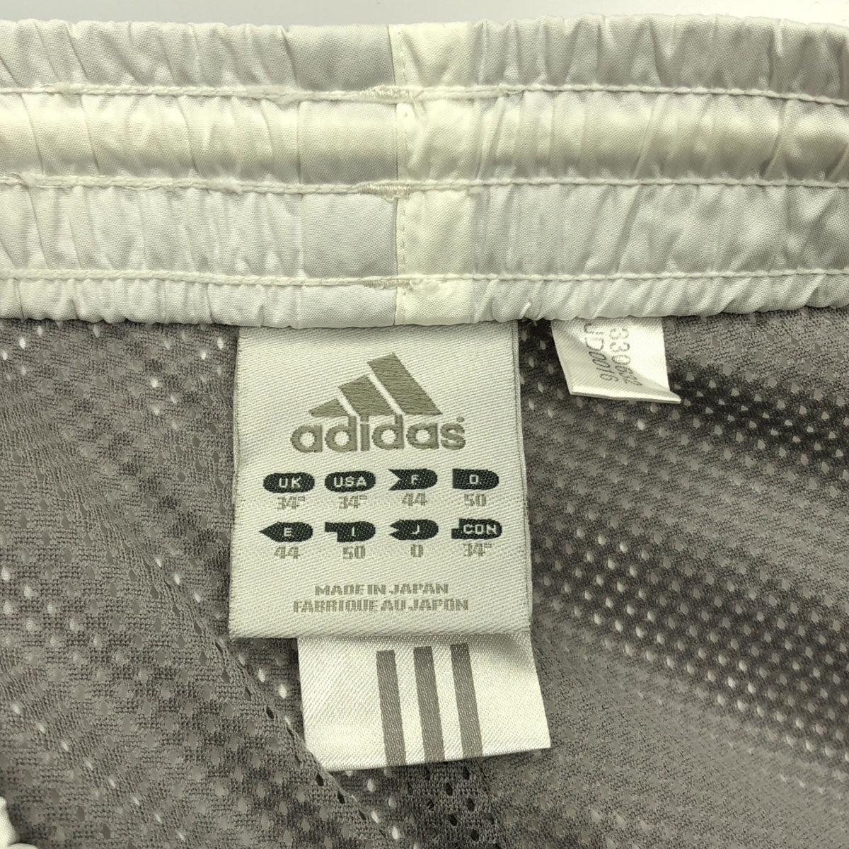 adidas アディダス 日本製 ロゴ刺繍 トレーニング ウインドパンツ O ホワイト 裾ジップ 裏メッシュ メンズ