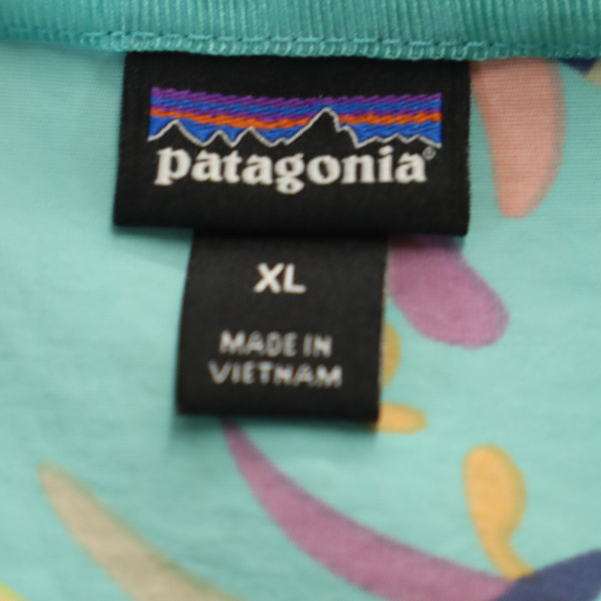 patagonia パタゴニア 総柄 ナイロンジャケット XL ブルー系 レディース