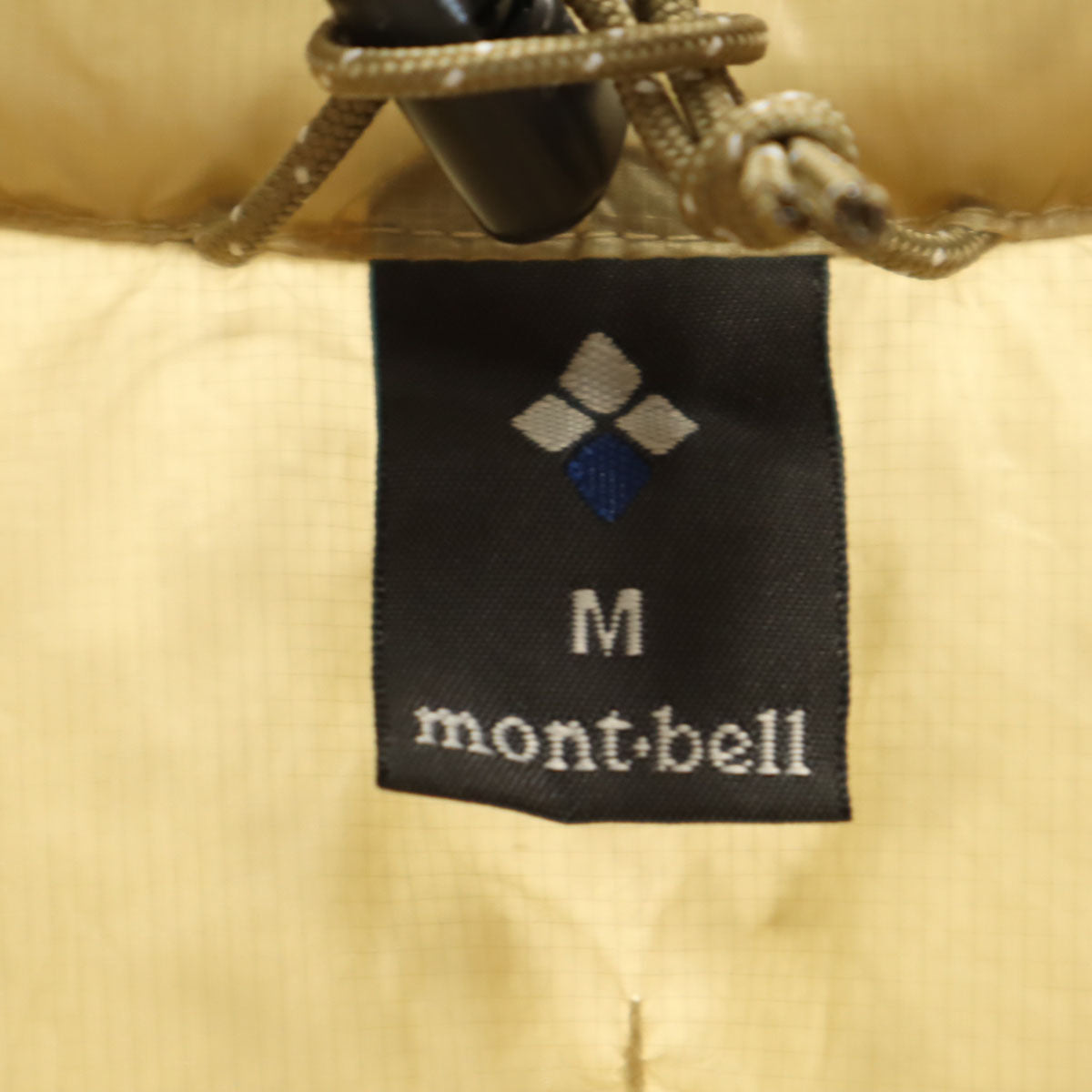 mont-bell モンベル プラズマ1000 ダウンジャケット M ベージュ 収納袋付き アウトドア 1101493 メンズ