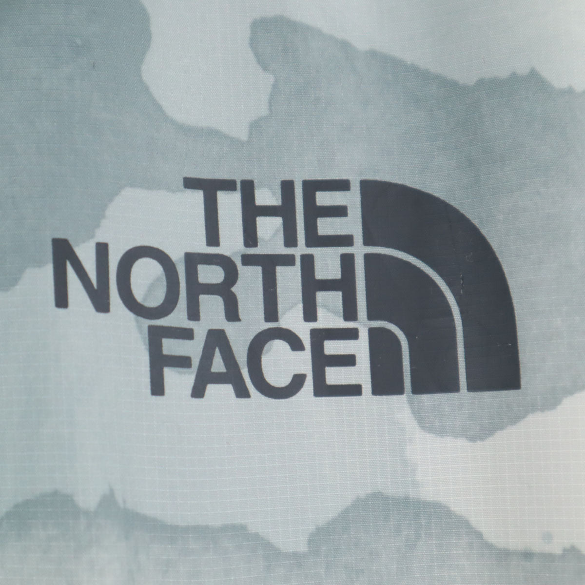 THE NORTH FACE ザノースフェイス 総柄 ウインドブレーカー L ライトグレー アウトドア A5K0 裏メッシュ メンズ