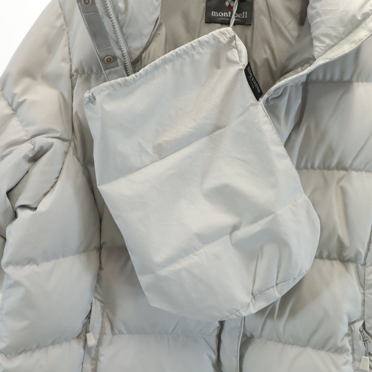 mont-bell モンベル トラベル ダウンパーカー ライトグレー アウトドア 収納袋付き レディース