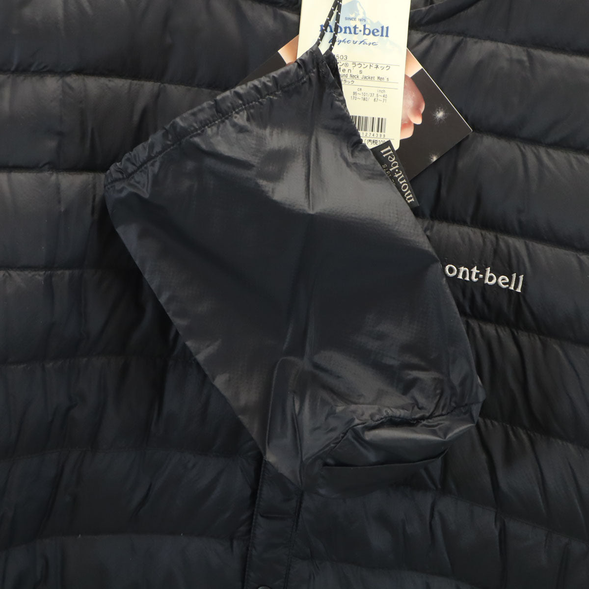 未使用 mont-bell モンベル スペリオ ラウンドネック ダウンジャケット L チャコールブラック アウトドア 収納袋付き メンズ