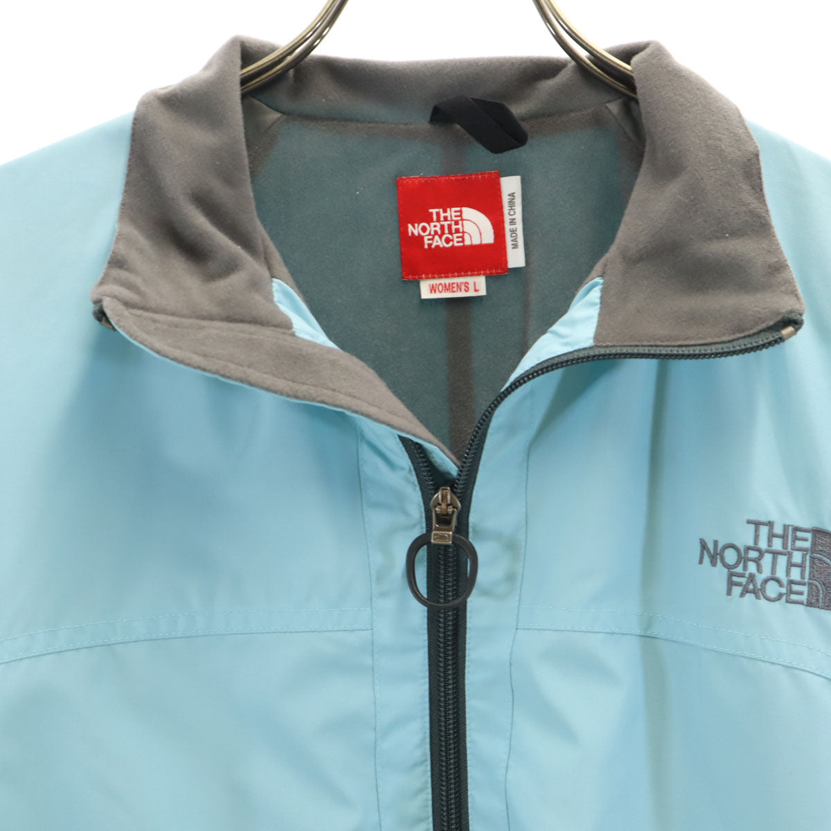 THE NORTH FACE ノースフェイス ウインドブレーカー L 水色 NPW-2957 アウトドア ジャケット 裏トリコット レディース