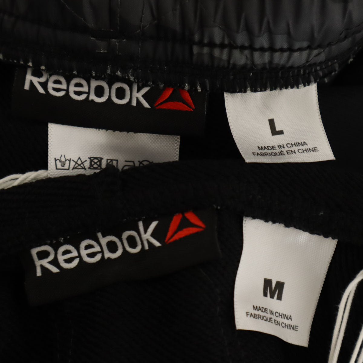 未使用 Reebok リーボック カモフラ柄切替 長袖 ジップパーカー 上下 セットアップ M/L ブラック ジャージ メンズ