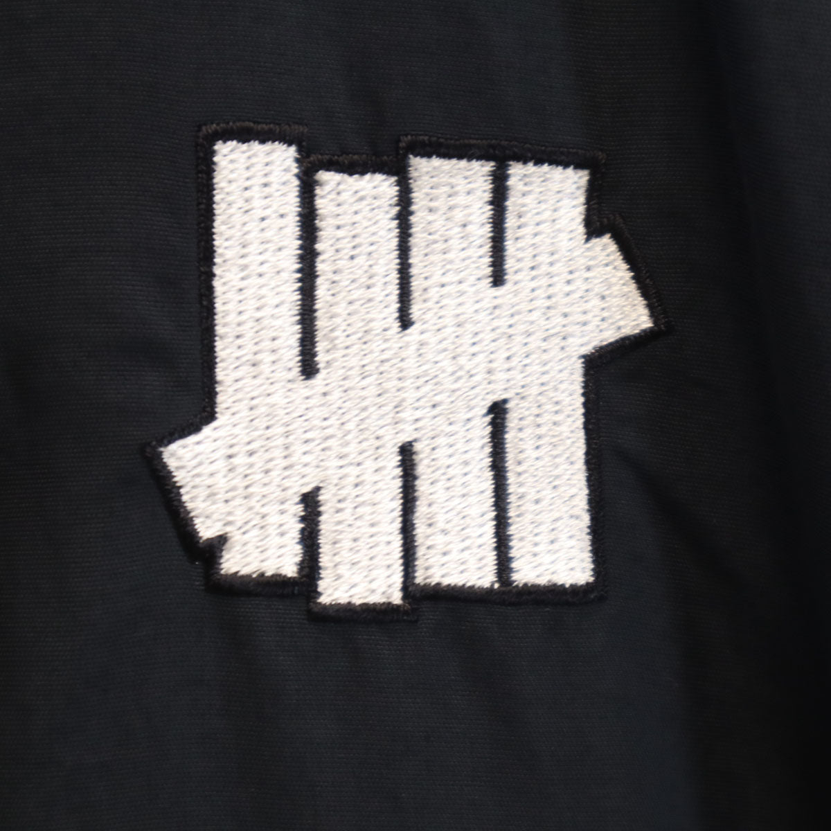 Champion チャンピオン UNDEFEATED アンディフィーテッド コラボ アノラックパーカー L ブラック メンズ