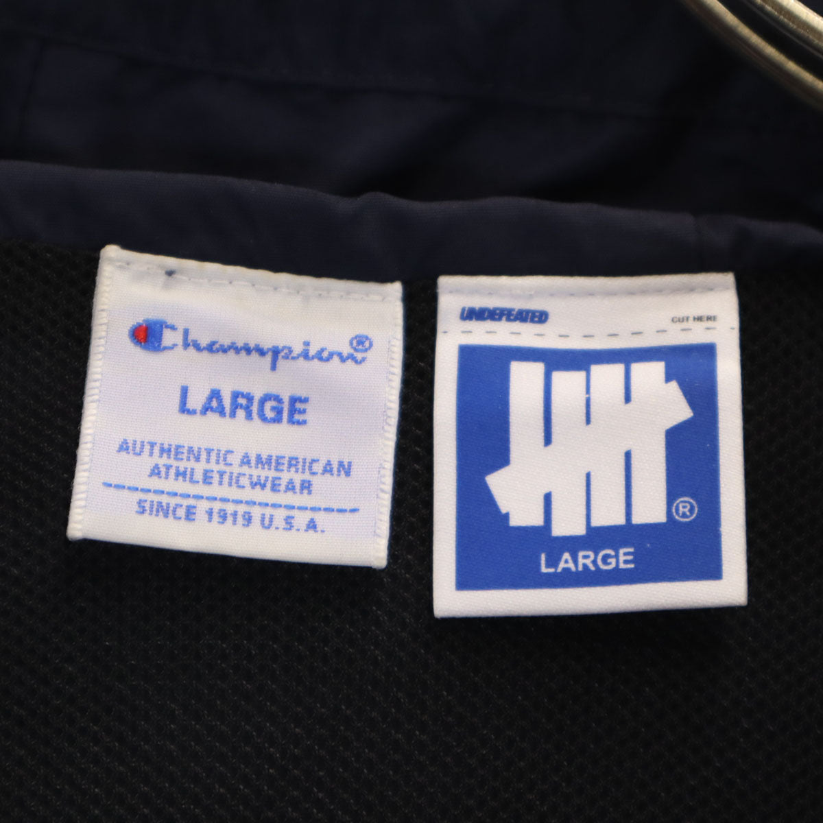 Champion チャンピオン UNDEFEATED アンディフィーテッド コラボ アノラックパーカー L ネイビー メンズ