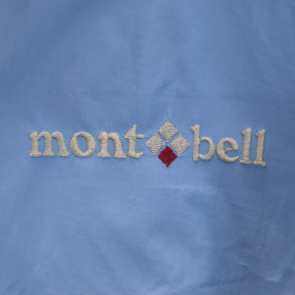 mont-bell モンベル レインジャケット L ブルー系 収納袋付き レディース